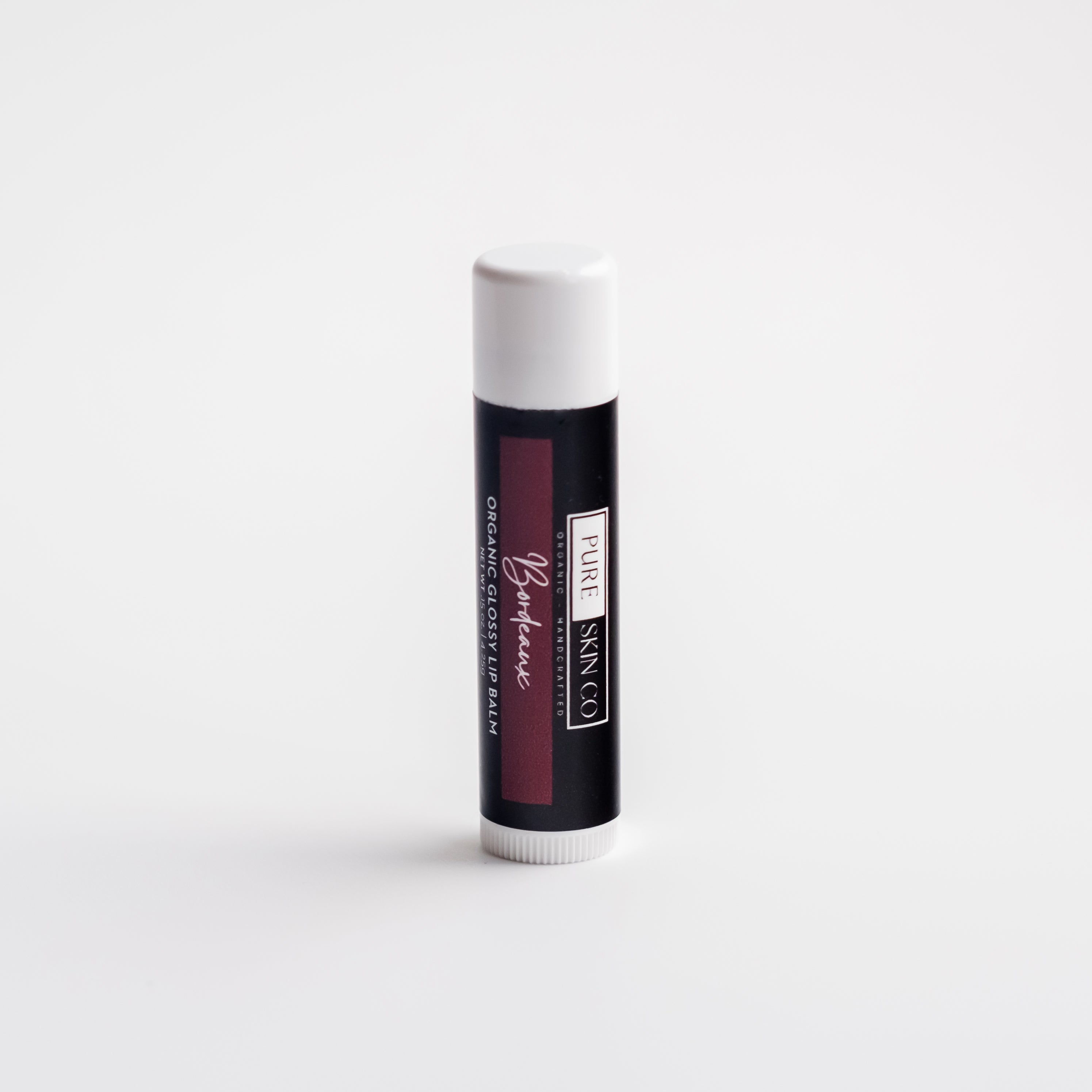 Pure Skin Co organic tinted lip balm in eco-friendly tube