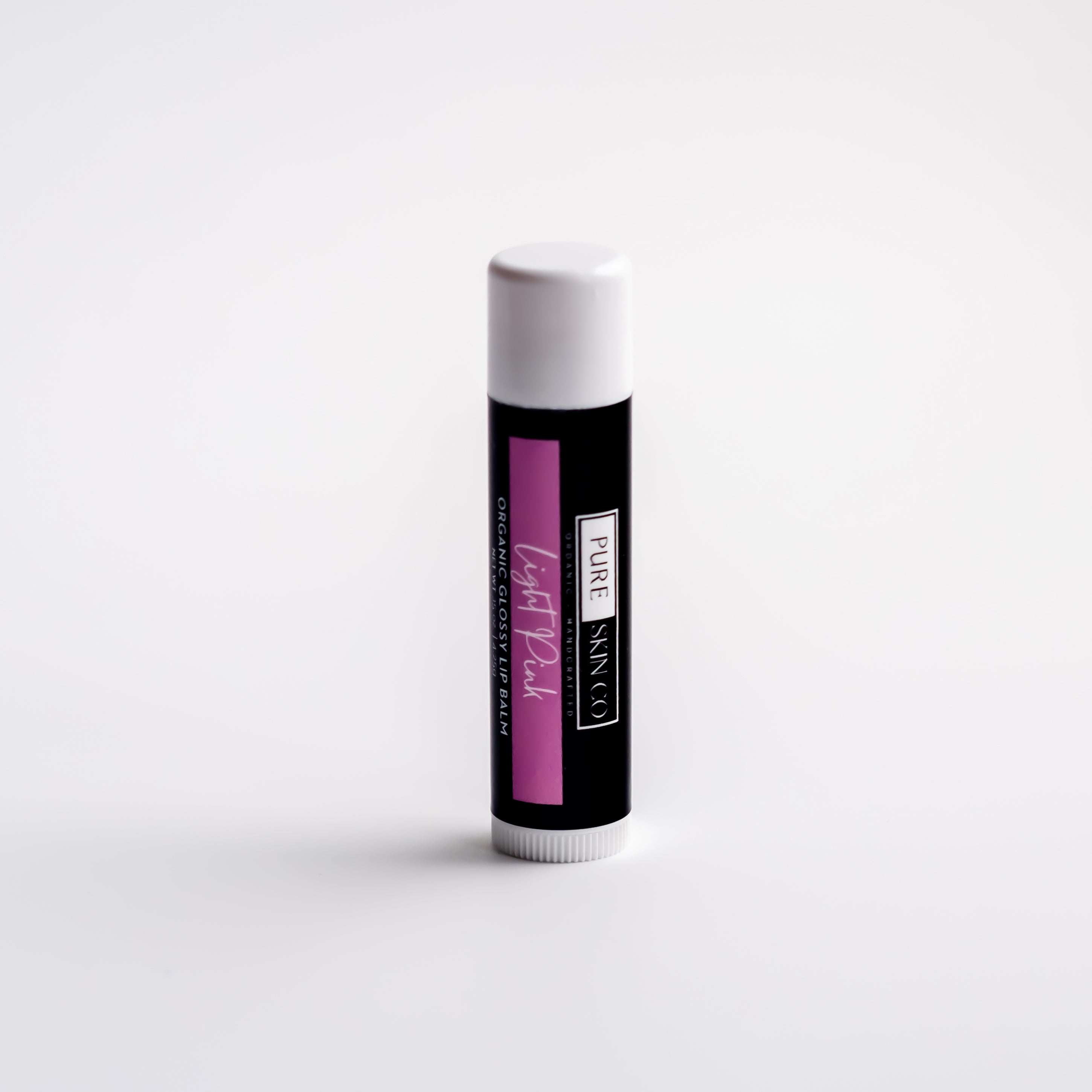 Pure Skin Co organic tinted lip balm in eco-friendly tube